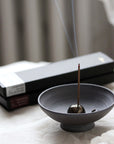 artisan incense holder in purple anthracite clay and natural incense sticks