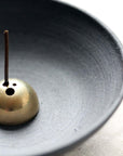artisan incense holder in purple/grey anthracite clay, with gold brass incense dome holder